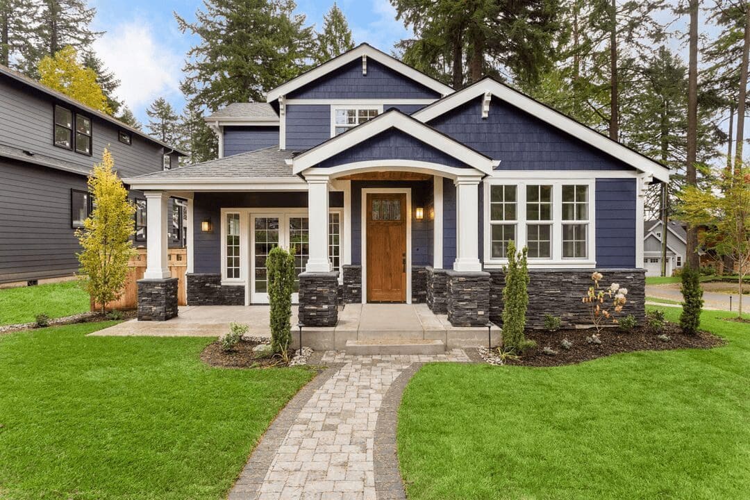 A house with blue siding and white trim.